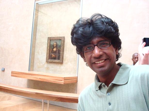 With Leonardo da Vinci's 'Mona Lisa' at the Louvre, Paris, France (July 2008)
