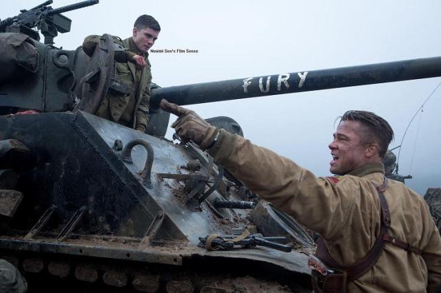 Logan Lerman & Brad Pitt, in a scene from FURY (2014) 