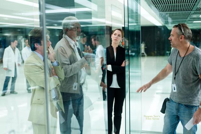Behind the scenes: Cillian Murphy, Morgan Freeman & Rebecca Hall being directed by Wally Pfister; on the sets of Transcendence (2014).