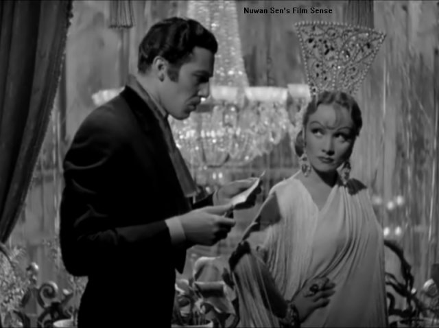 Marlene Dietrich and Cesar Romero in a scene from the film.